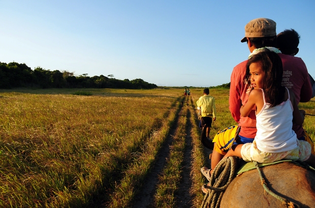 Local folks of Fuga island on their way home