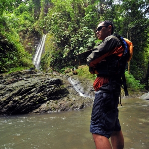 Checking out a waterfall along the river route