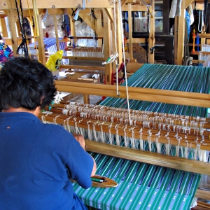 Local women of Sagada work on their weaving looms