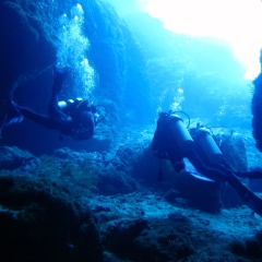 Exiting a cave in Gato Island